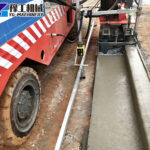 High-efficiency slipform curb machine