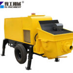 stationary concrete pump on construction site