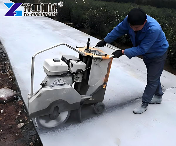 Asphalt and concrete cutter working