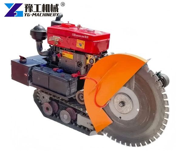 Tracked concrete road cutter machine cutting pavement