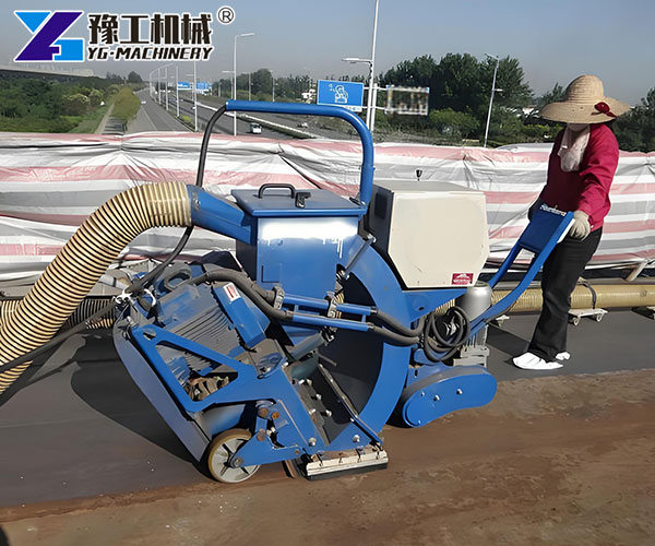 Asphalt road shot blasting machine works